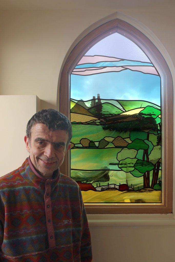 This image has an empty alt attribute; its file name is Dave@work-683x1024.jpg